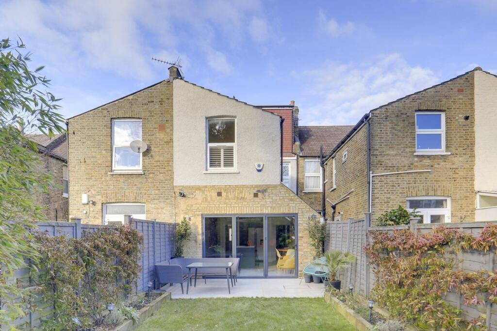 Lewisham garden with a rear extension and patio