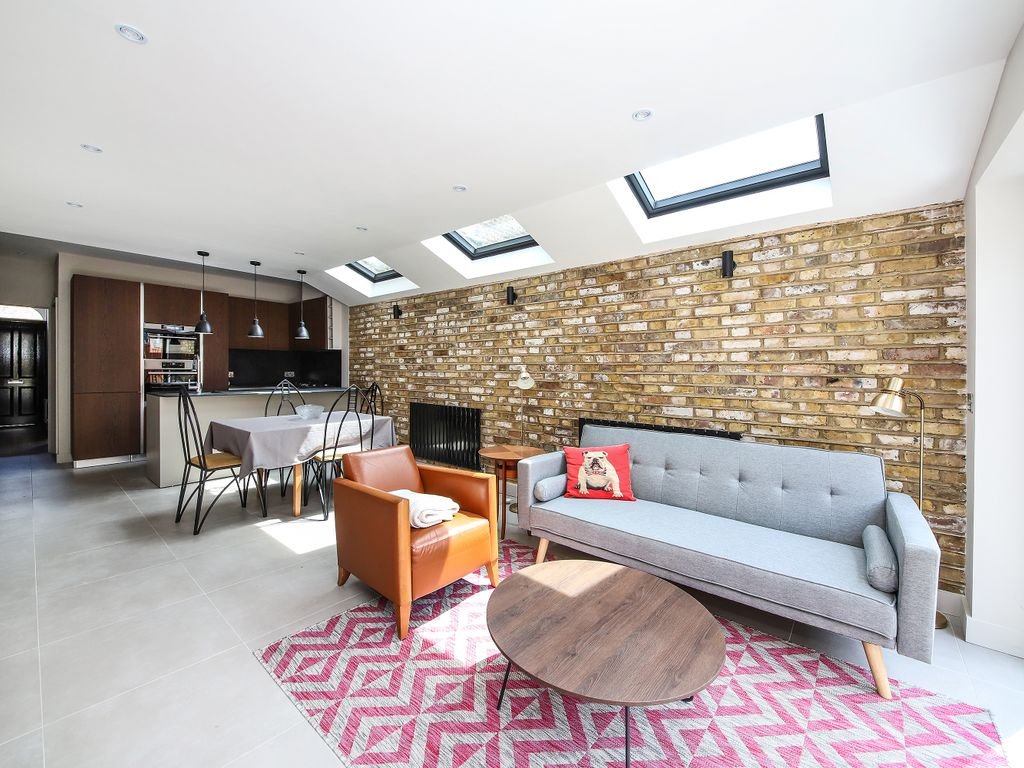Southwark 2019 living room project with an open-plan kitchen, skylights and exposed brick wall